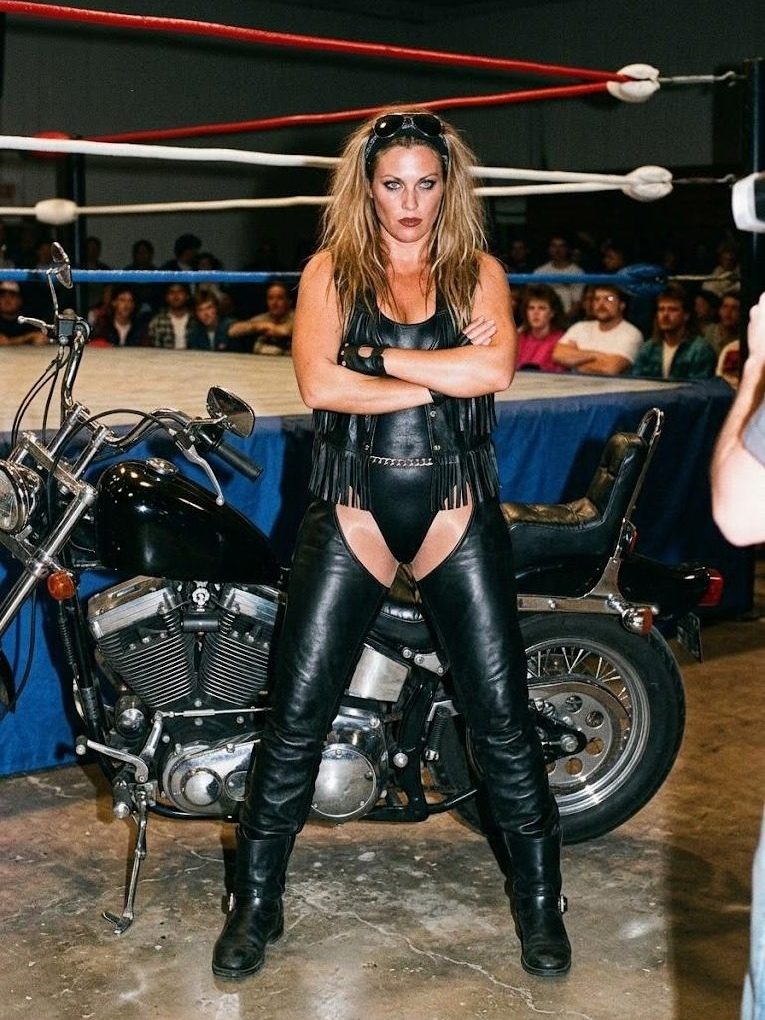 Biker Bonnie in the ring at a G.L.A.M. taping
