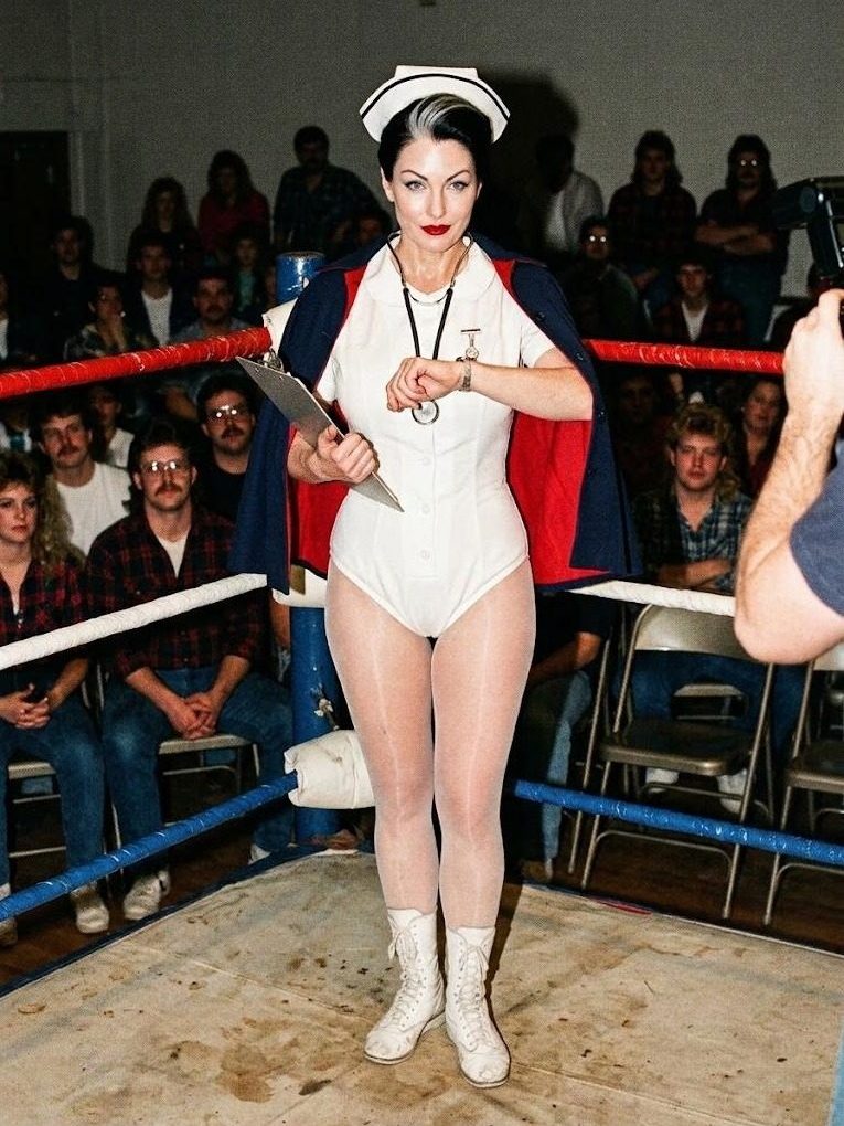 Head Nurse Hilda in the ring at a G.L.A.M. taping